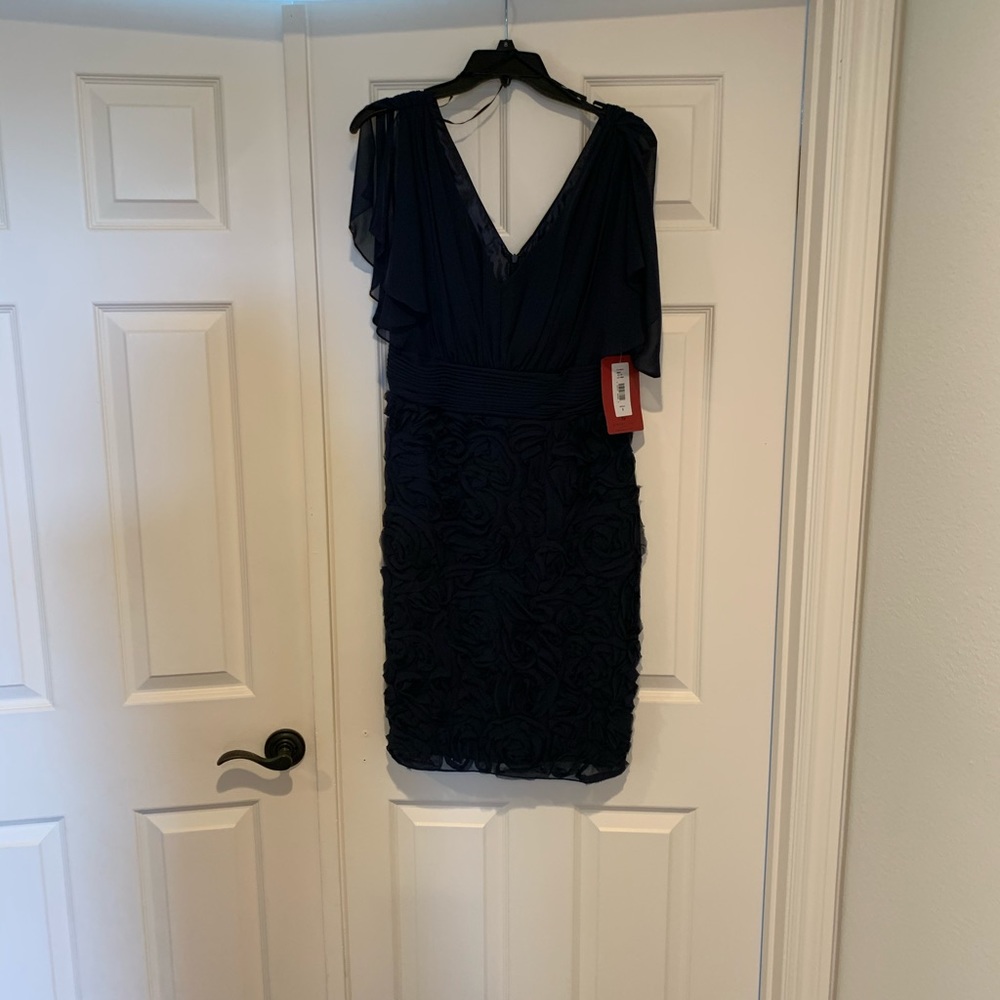 Navy split sleeve w/ rosette flowers on bottom 1/2